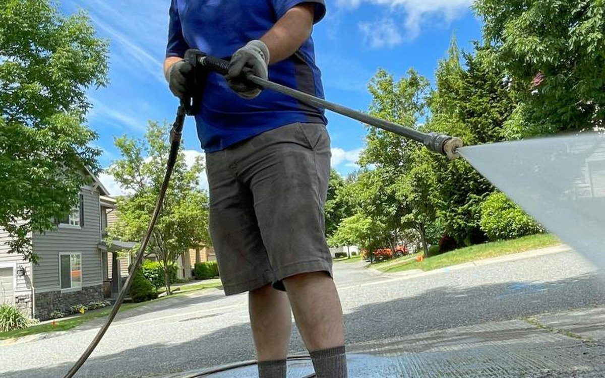Pressure washing Kildare: patio being cleaned with a pressure washer