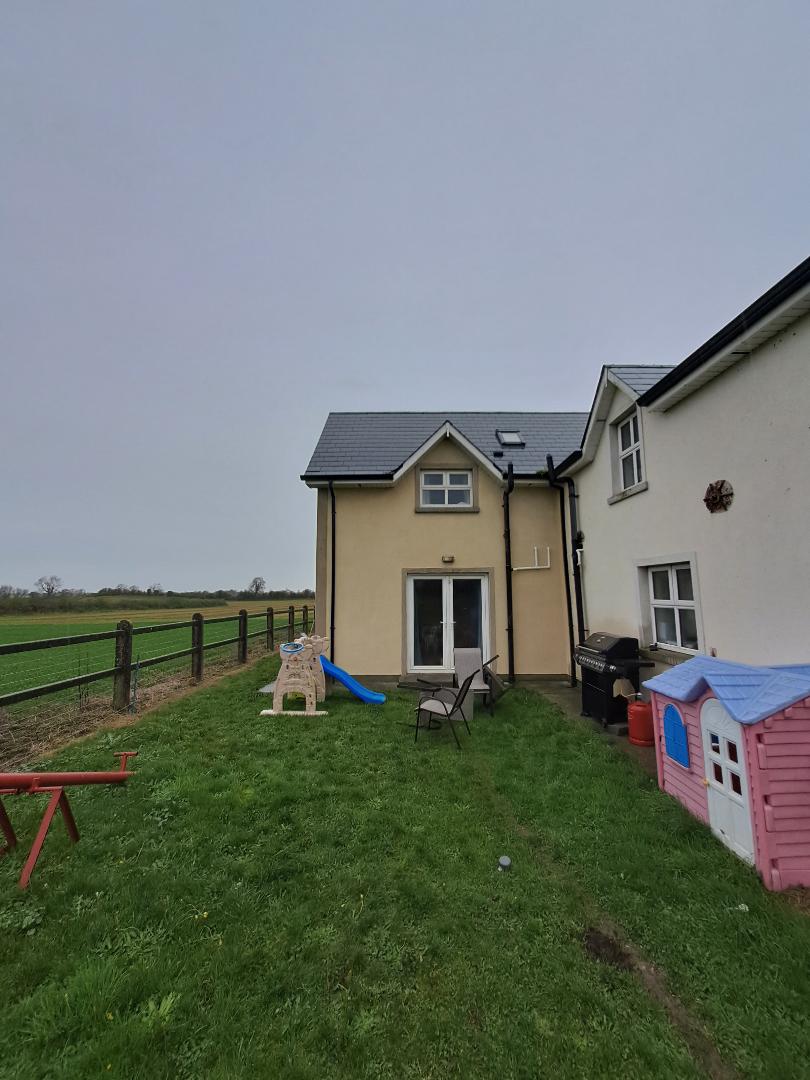 Before and after exterior cleaning Kildare: rear extension walls washed, after