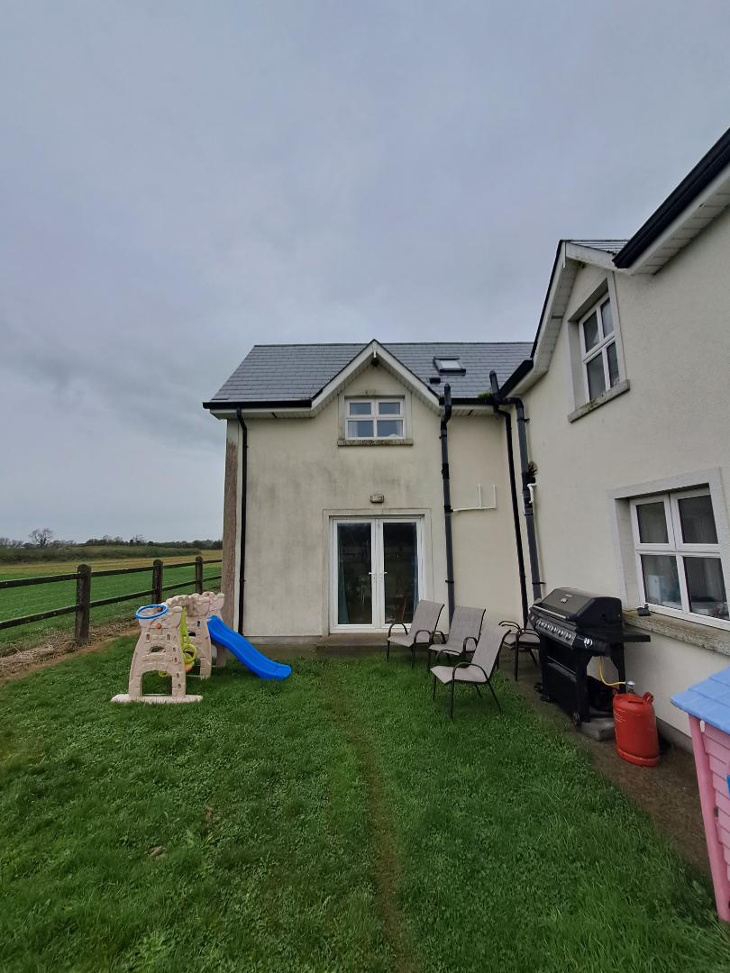 Before and after exterior cleaning Kildare: rear extension walls washed, before